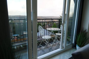 Two-Bedroom Apartment with Scenic Balcony View